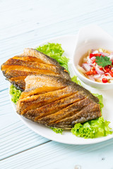 crispy gourami fish with spicy salad