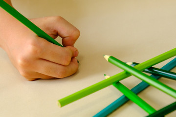 Green Pencil hand draw on background