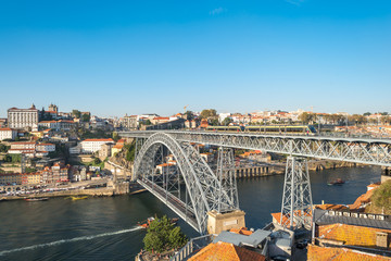 View of Porto with the famous Dom Luís I bridge, where the tram runs