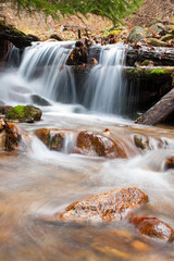flowing water in the stream - 242495938