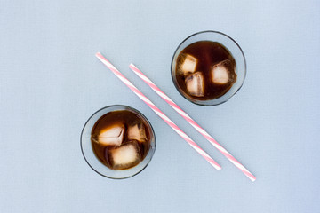 Two Glasses Filled with Ice Coffee and Ice Cubes