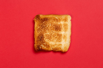 fried toast on a red background