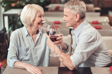 Passionate retired man looking at the woman