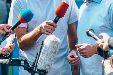 Media Event Outdoors. Journalists Interviewing Male Speaker