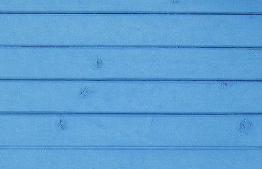 Naklejka premium Red vintage painted wooden panel background