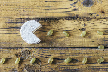 Camembert with green grapes