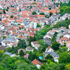 Fototapeta na wymiar Panorama of the city. Germany. The type of roofs and streets from above.