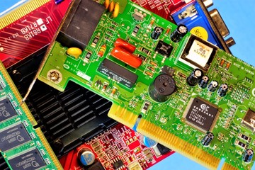 The printed circuit Board and radio for a computer.  Printed circuit Board is designed for electrical and mechanical connection of electronic components usually by soldering.