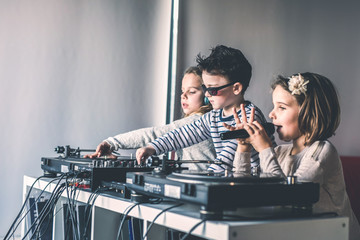 Young DJs make a party at home with vinyl records