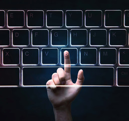 Male hand touching on virtual keyboard.