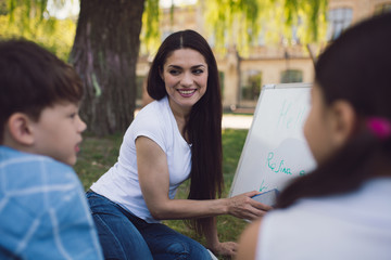 Group of children with teacher in park