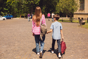Obraz premium Mother and son after school