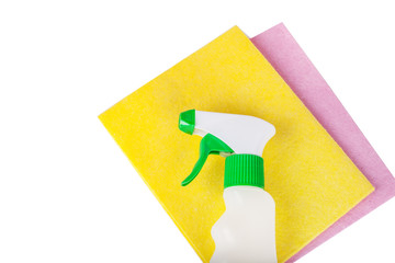 Household cleaning clothes stack and a bottle with spray.