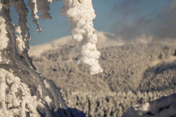 Fantastic winter mountain landscape glowing by sunlight