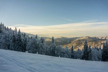 Fantastic winter mountain landscape glowing by sunlight