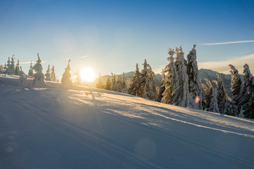 Fantastic winter mountain landscape glowing by sunlight