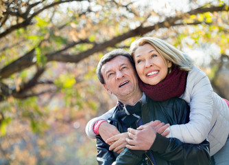 Portrait of happy smiling positive elderly couple