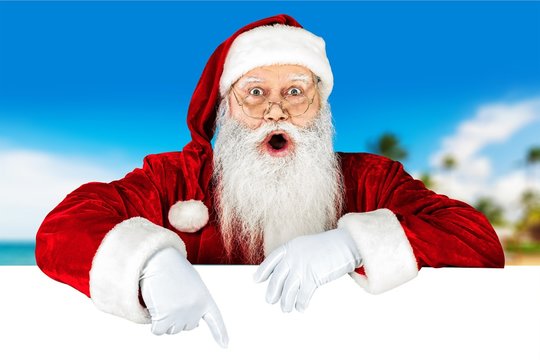 Portrait of Surprised Santa Claus on white background