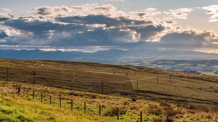 Naklejka premium View over Greenfell Raise from Hartside Top on the A686 between Alston and Melmerby, Cumbria, England, UK - with the Lake District in the background