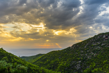Obraz premium Greece, Zakynthos, Magic sunset sky and green valley to the ocean