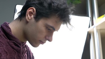 Student repair of electronic devices, tin soldering parts in electronics workshop