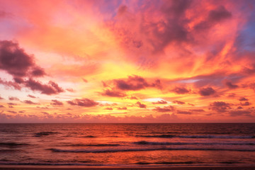 Fototapeta na wymiar Beautiful sunset with long exposure effect, motion blurred at Nai Yang Beach, Phuket, Thailand.