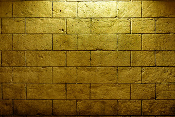 Cement wall with light of spotlight.