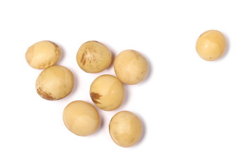 Organic raw soybeans, isolated on white background, top view