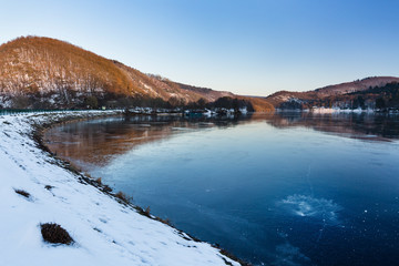 Frozen Lake Rursee At Rurberg, Germany