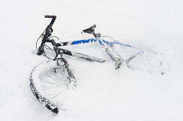 Mountain bike snowing ride in winter