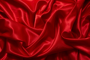 Luxury red satin smooth fabric background for celebration, ceremony, event invitation card or advertising poster