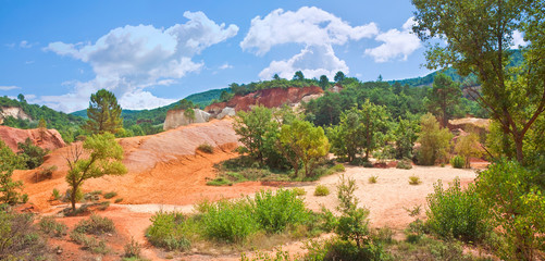 Particular French landscape, in the provence region, called Colorado Provencal with its ocher, yellow and red earth (Europe-France-Provence)