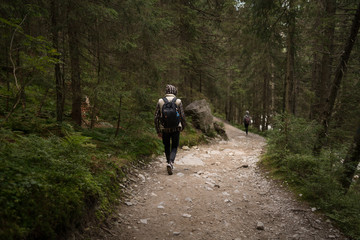 The guy going on a mountain trail