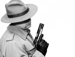 Vintage detective with gun