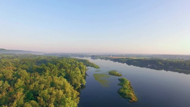 aerial view of river at sunrise, fly over morning mist on the river, Very high view of the river at sunrise, Aerial view of mystical river at sunrise with fog, sun above the river aerial