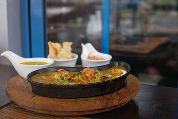 Close up of shrimps curry in a pan