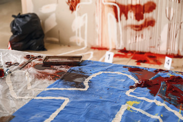 Crime scene with instruments of tortures