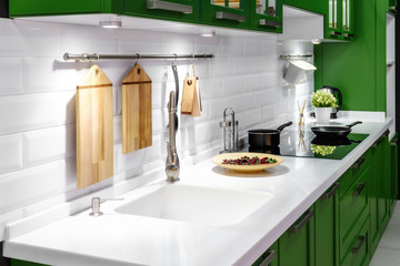 Acrylic kitchen sink built into the countertop