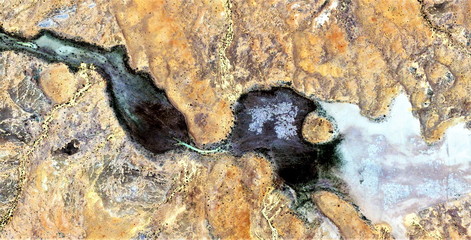  black gold, polluted desert sand, abstract photo of the deserts of Africa from the air. aerial...