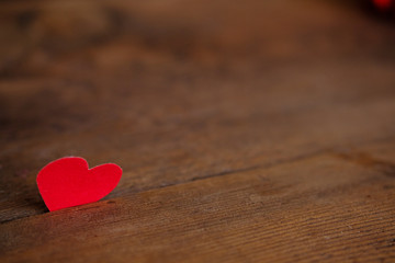 Fototapeta premium Red heart on a blue wooden board. Copy space