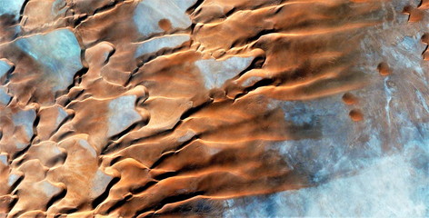 The power of wind, abstract photography of the deserts of Africa from the air. aerial view of...
