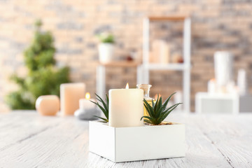 Aroma candle on light table