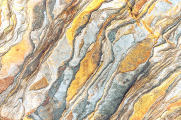 Rock layers - a colorful formations of rocks stacked over the hundreds of years. Interesting background with fascinating texture