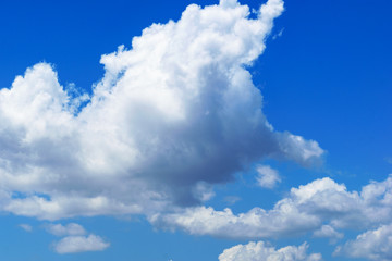 Naklejka na ściany i meble Blue summer sky white cumulus clouds background
