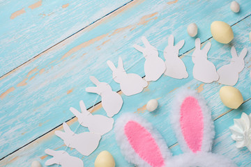 Rabbit ears and sweets. Easter background. Top view, Flat lay