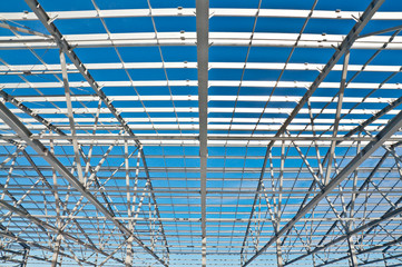 Fototapeta premium Structure of building. Steel construction on sky background