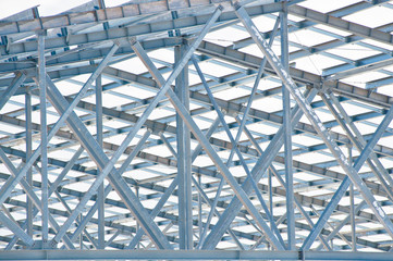Structure of  building. Steel construction on sky background