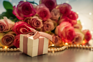 fresh rose flowers on gray