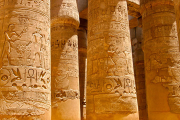 Columns covered in hieroglyphics, Karnak, Egypt.
