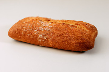 Fresh gluten free grain bread with seeds isolated on white background.